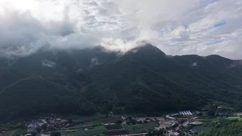 Serene Forward Drone Flight Over Misty Valley and Mountains, South Korea Stock Footage 345867532
