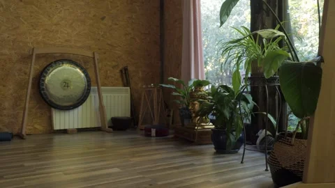A serene gong in a calm studio creates a peaceful atmosphere for relaxation and Video stock 326756381