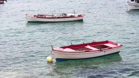 Serene Harbor With Two Boats Floating On Clear Water During Summer Day Stock Footage 304585389