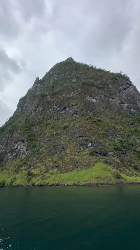 In this serene image, a distant mountain range reflects beautifully Stock Footage 314072724