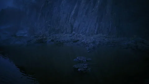 Serene inlet at twilight showcasing tranquil waters and misty rocks Stock Footage 340339284