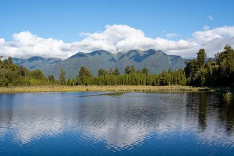 Serene Lake with Mountain Reflection Stock Photos