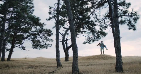 A Serene Landscape Capturing a Couple in Nature Embracing Its Beauty and Stock Footage 318520133
