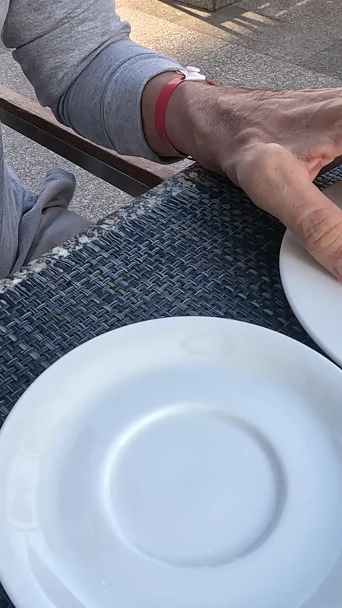 A Serene Moment Captured, Showcasing a Half-Empty Coffee Cup with Rich Swirls of Видео 331115793