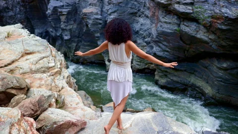 A Serene Moment by the River: Capturing the Essence of Nature and Self Stock Footage 314056488