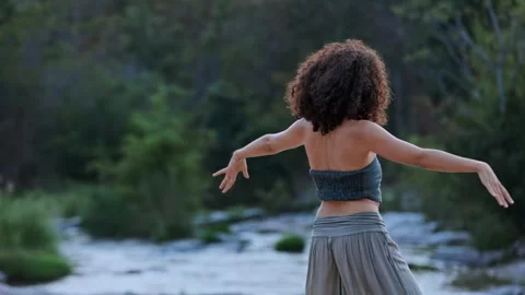 A Serene Moment by the River: Capturing the Essence of Nature and Reflection in Stock Footage 315647239