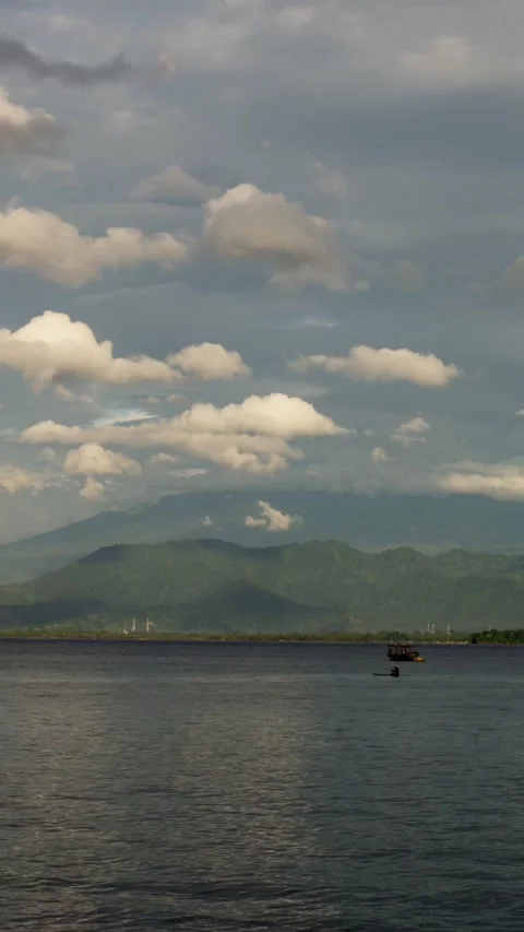 A serene mountain reflection beautifully displayed over tranquil waters of a Video stock 308588748