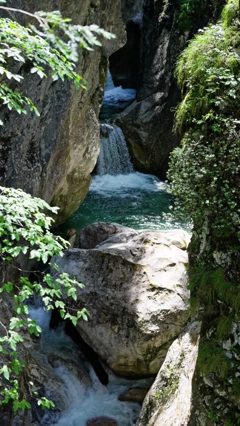 A Serene Mountain Stream Gracefully Flowing Through A Beautiful Rocky Landscape Stock Footage 314745747