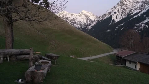 Serene mountain valley sunrise with rustic wooden fence Stock Footage 307302239