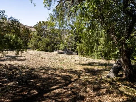 Serene natural landscape featuring a distant structure Fotos de archivo