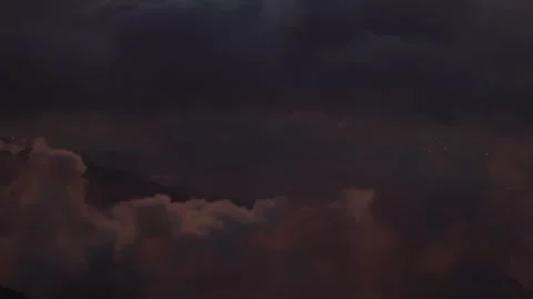 Serene night sky with fluffy clouds and city lights Video stock 301896935