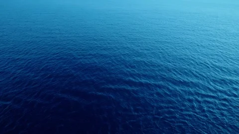 Serene ocean with calm blue waves stretching to the horizon, endlessness. Stock Footage 323076306