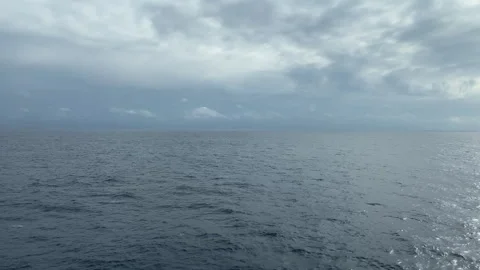 Serene Ocean Expanse: Cloudy Horizon Stock Footage 247421065