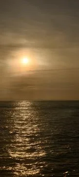 A serene ocean view during sunset 写真素材