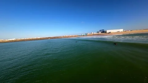 Serene ocean view with gentle waves, clear sky at Peniche Stock Footage 346077206