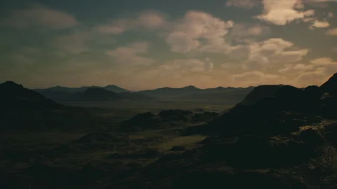 Serene open lands with faroff peaks and peaceful sky visuals Stock Footage 331531484