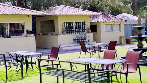 Serene Outdoor Café with Hookah Setup - 4K. Stock Footage 307397293