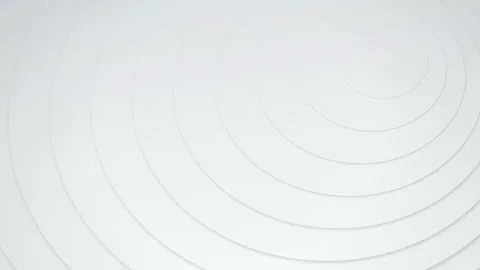 A serene pattern of expanding white concentric circles gently pulses with su Stock Footage 340678287