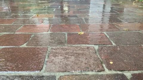 Serene Rainfall in Terracotta Courtyard Stock Footage 246225258