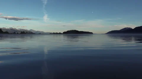 Serene Reflection Rippling Lake Surface Mist Gathering Stock Footage
