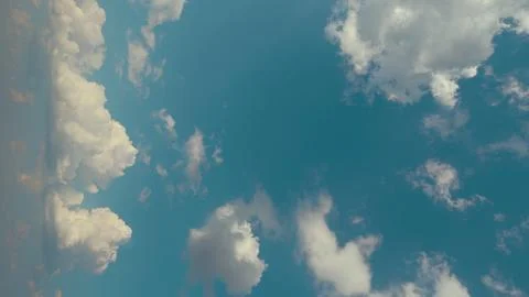 A Serene Sky Featuring Fluffy Clouds During a Beautiful Day Time with Breathtaki Stock Photos