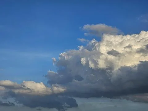 Serene sky filled with an array of clouds. These clouds Fotos de archivo