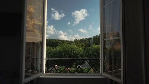Serene slow motion push through window to reveal summer morning in France Stock Footage 119535437