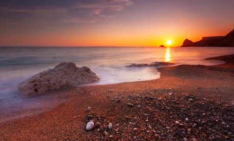 Serene South Dorset Beach and Sea at Sunset Stock Photos