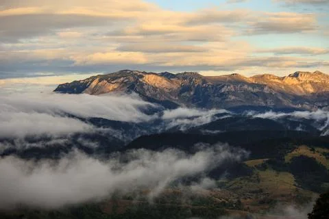 Serene Sunrays Over the Mountain Stock Photos