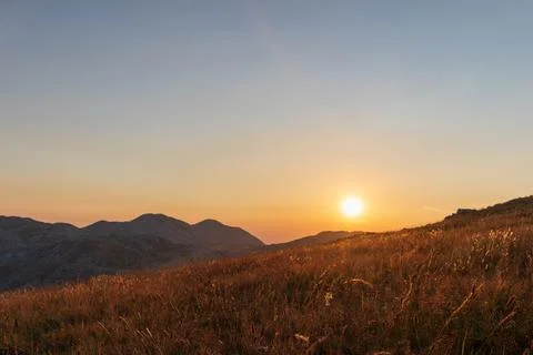 Serene Sunrays Over the Mountain Stock Photos