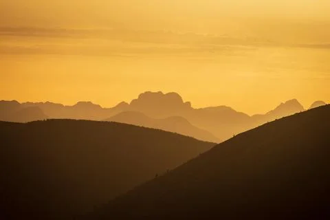 Serene Sunrays Over the Mountain Stock Photos
