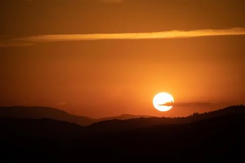 Serene Sunrays Over the Mountain Stock Photos