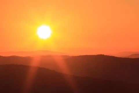 Serene Sunrays Over the Mountain Stock Photos