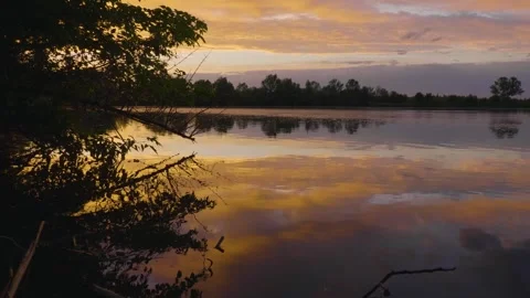 Serene Sunrise or Sunset Reflections on the Ros River, Ukraine Stock Footage 326278328