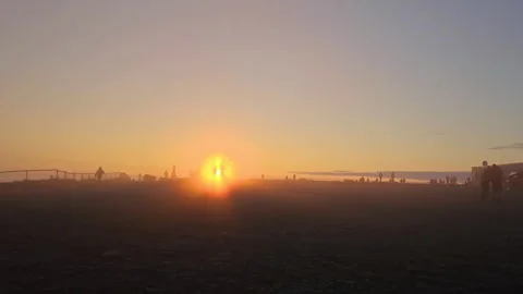 Serene sunset at a beach gathering Stock Footage 269959552