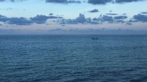Serene sunset with boat Stock Footage 131844166
