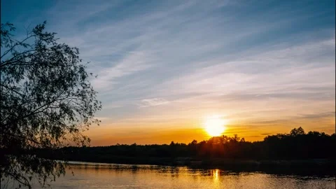 A Serene Sunset Over Calm Waters Showcasing A Vibrant Sky And Its Beautiful Stock Footage 280548120
