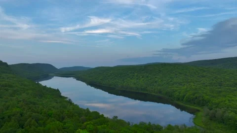 Serene Sunset Over the Lake of the Clouds in the Porcupine Mountains 動画素材 282070764