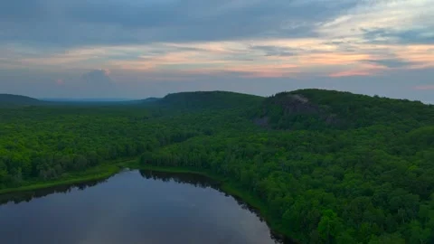 Serene Sunset Over the Lake of the Clouds in the Porcupine Mountains 動画素材 282070905
