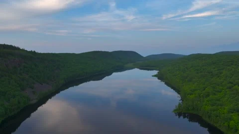 Serene Sunset Over the Lake of the Clouds in the Porcupine Mountains 動画素材 282070926