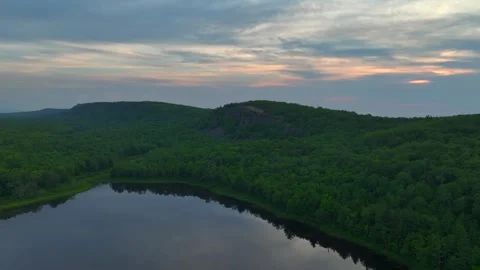 Serene Sunset Over the Lake of the Clouds in the Porcupine Mountains 動画素材 282070943