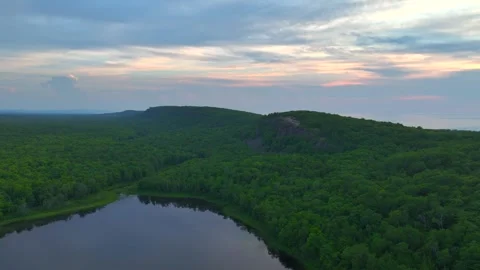 Serene Sunset Over the Lake of the Clouds in the Porcupine Mountains 動画素材 282070959