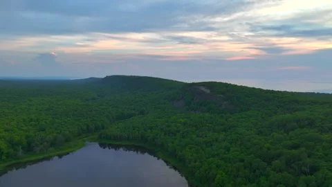 Serene Sunset Over the Lake of the Clouds in the Porcupine Mountains 動画素材 282070990