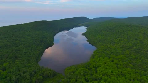 Serene Sunset Over the Lake of the Clouds in the Porcupine Mountains Stock Footage 282071291