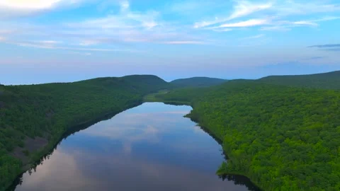 Serene Sunset Over the Lake of the Clouds in the Porcupine Mountains Stock Footage 282071489
