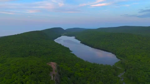 Serene Sunset Over the Lake of the Clouds in the Porcupine Mountains Stock Footage 282071996