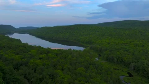 Serene Sunset Over the Lake of the Clouds in the Porcupine Mountains Stock Footage 282071998