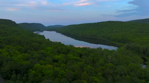 Serene Sunset Over the Lake of the Clouds in the Porcupine Mountains Stock Footage 282072020