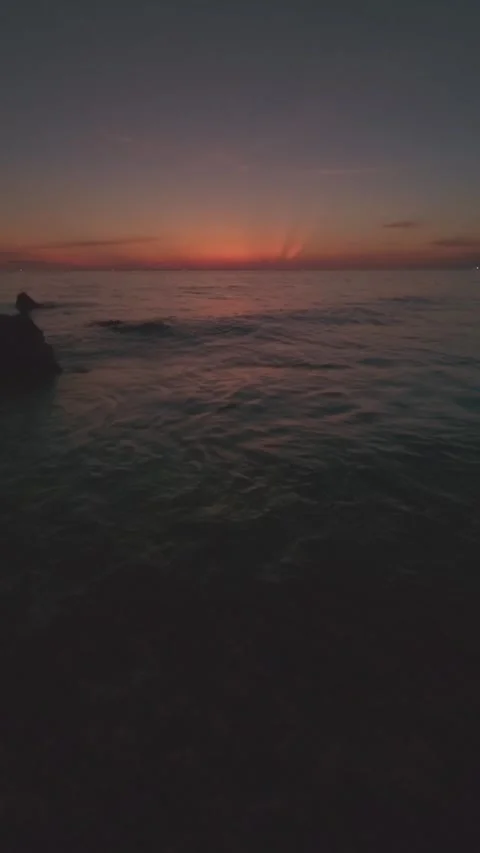 Serene Sunset Over Ocean Waves Stock Footage 305981552
