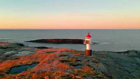 Serene Sunset over Storesundet Lighthouse, Norway Stock Footage 315728963